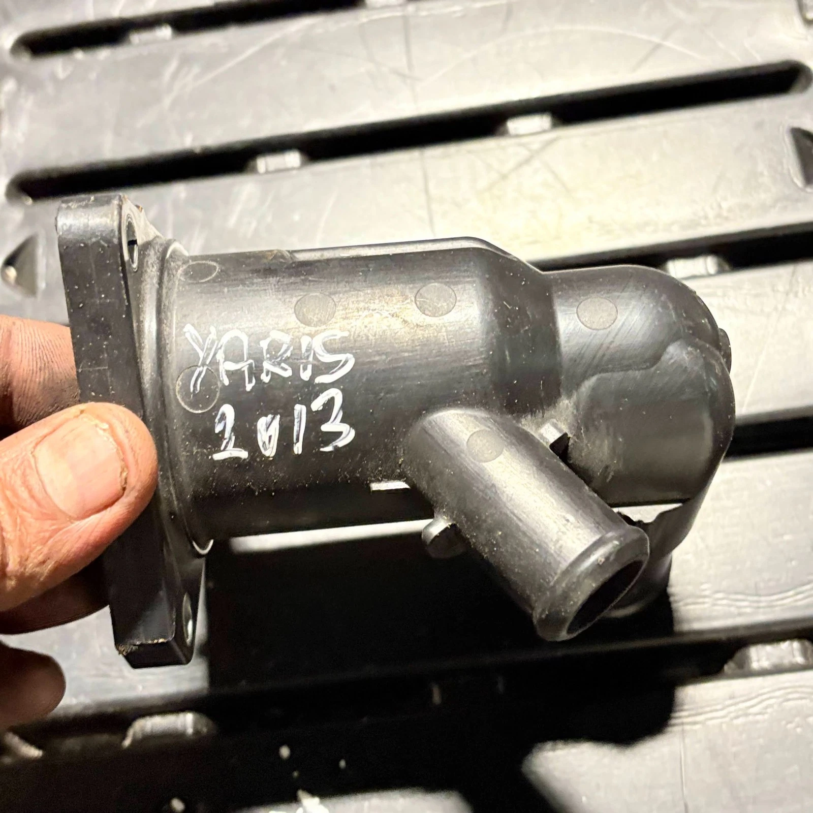 Toyota Yaris thermostat housing water inlet actual item