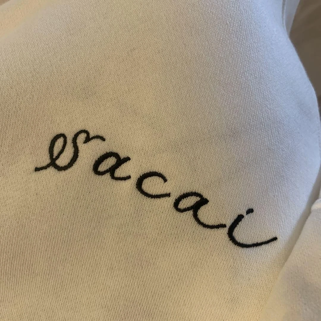 Felpa con cappuccio collaborazione Sacai Dr Woo esaurita