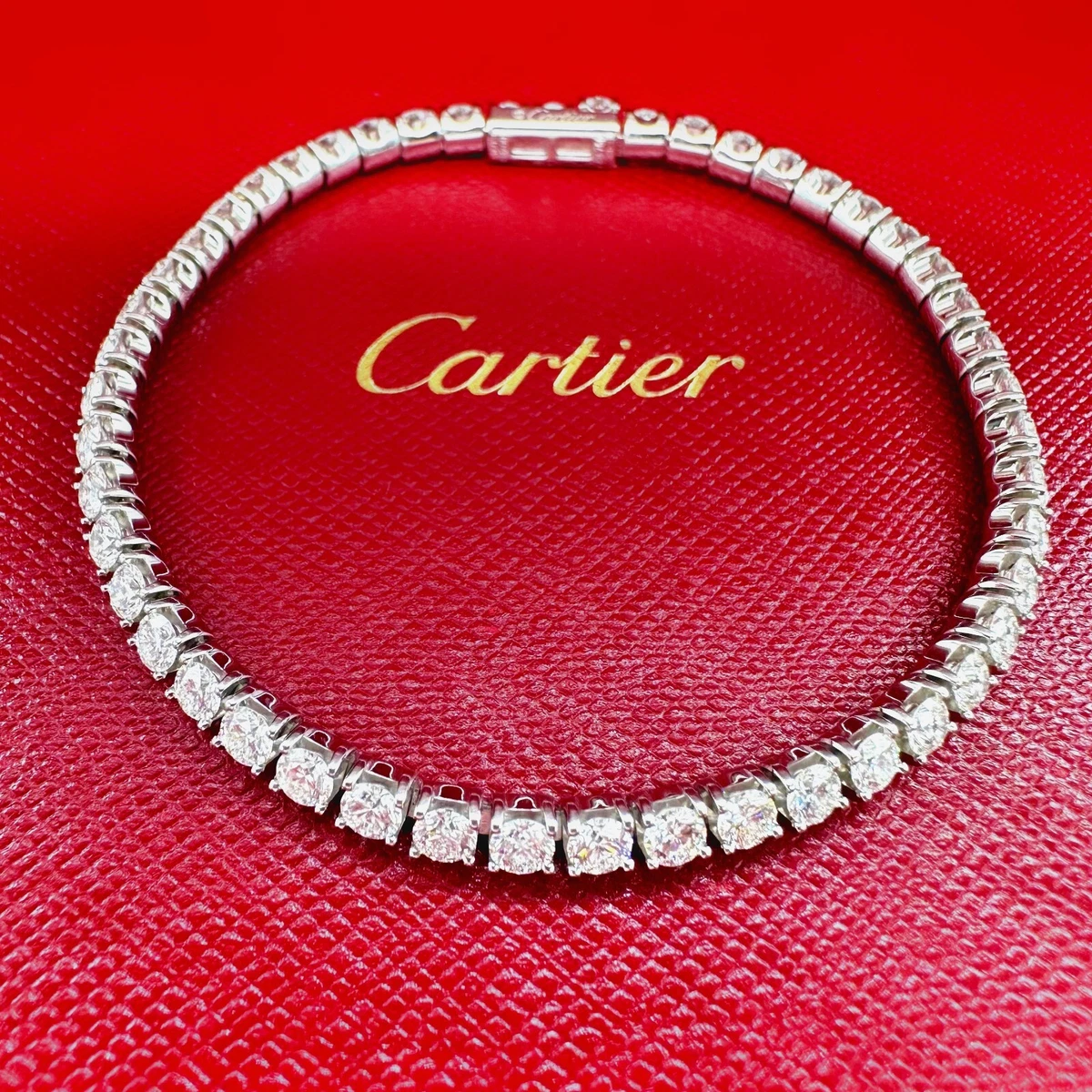 Sold at Auction: 18k LV Style Diamond Bracelet