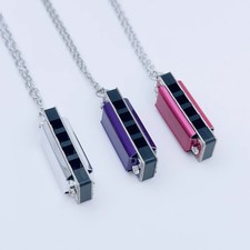 New 4-hole 8-tone Necklace Harmonica Mini Woodwind Music Toy Chain Metal Harmoni
