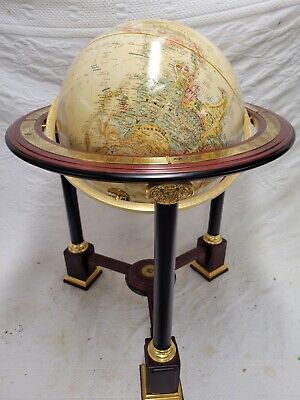 Sold at Auction: Royal geographical Society world globe on wooden