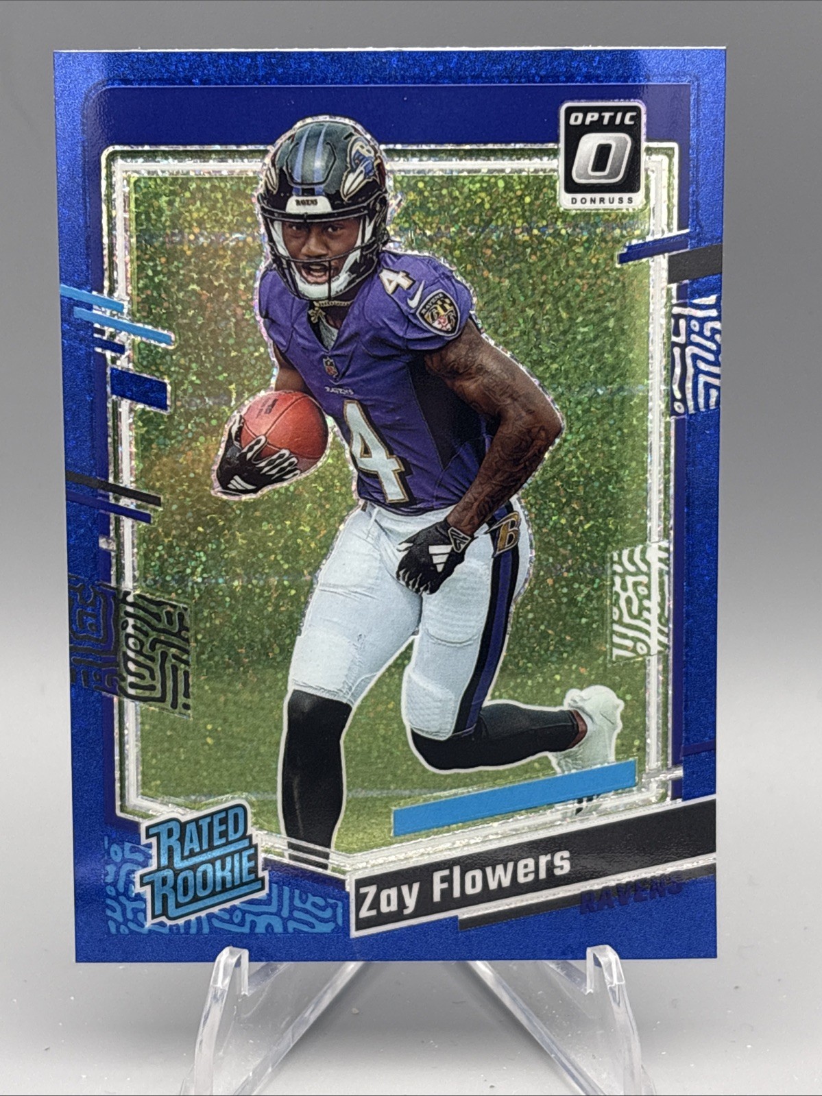 A346 2023 Panini Donruss Optic Zay Flowers Blue Glitter Rated Rookie #210
