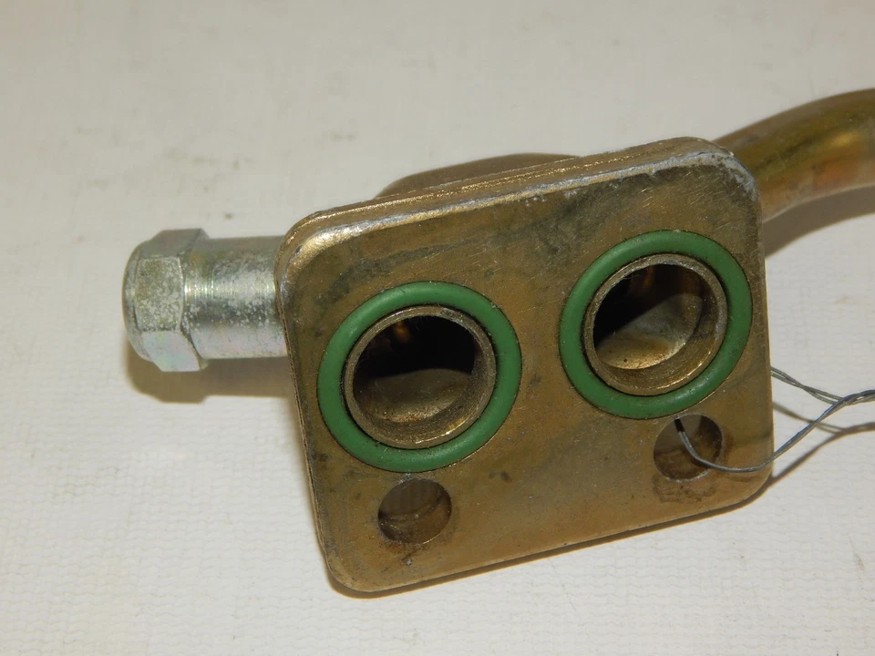 Nuevo colector de descarga de refrigerante aire acondicionado topacio Mercury Ford Tempo 1987-1991 fabricante de equipos originales Foto 4 de 4