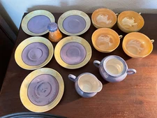 BLUE LUSTERWARE 4 TEA CUPS, 5 SAUCERS, SALT SHAKER, CREAMER AND A SUGAR BOWL