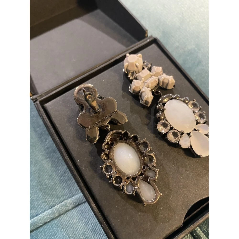 EK Thongprasert pierced earrings