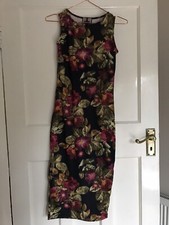 2 sleeveless summer dresses size 8, length - below the knee
