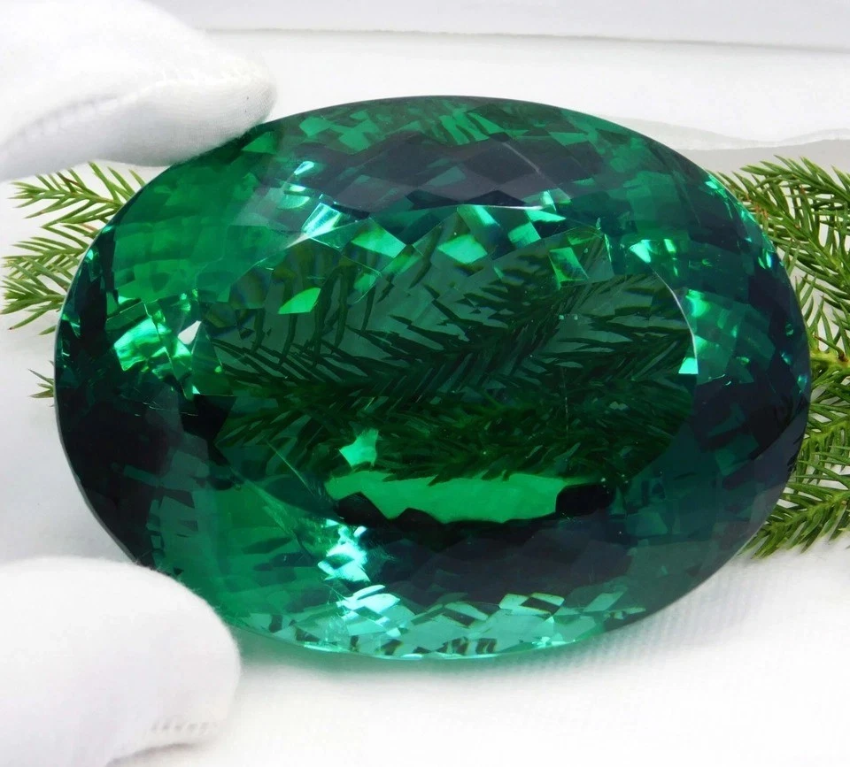 Piedra preciosa granate verde tsavorita natural certificada de 1550,00 quilates - corte ovalado grande Foto 3 de 4