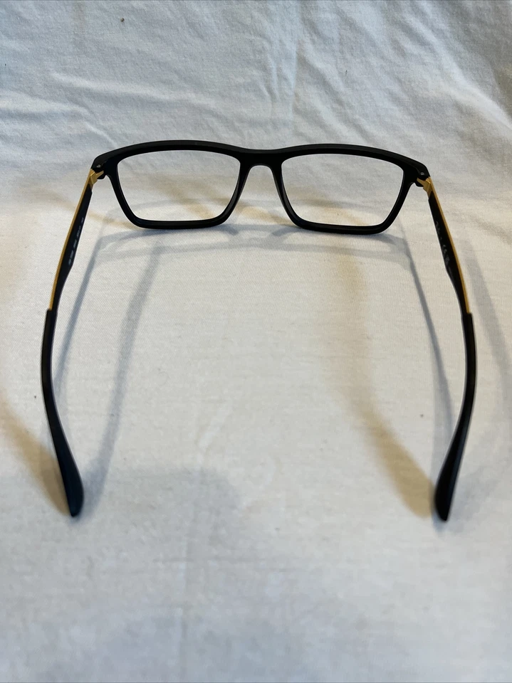 Monturas para gafas Ray Ban RB7056 5644 55[]17-145 negras y doradas Foto 4 de 4