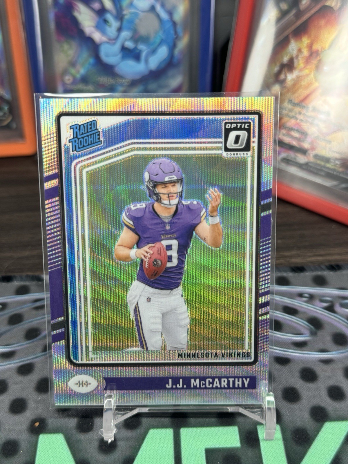 2024 Panini Donruss Optic - Rated Rookie J.J. McCarthy #235 Wave Prizm /300 (RC)