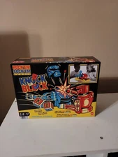 ​Rock ‘Em Sock ‘Em Robots Boxing Game with Manually Operated Red Rocker