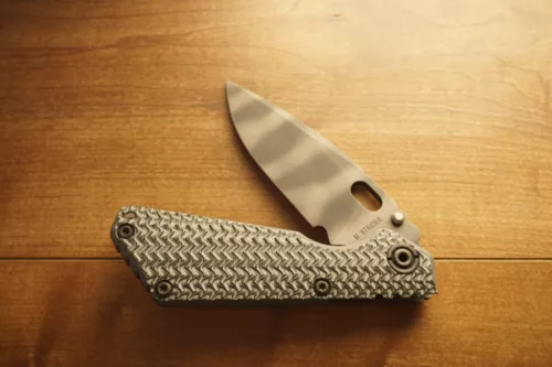 Strider Knives SnG - G10 & Ti / CPM20CV Tiger Stripe Blade