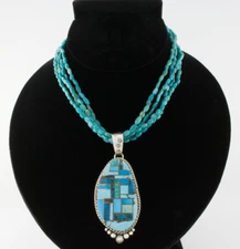 Turquoise Inlay Pendant Hung On A 4-Strand Turquoise Nugget Necklace
