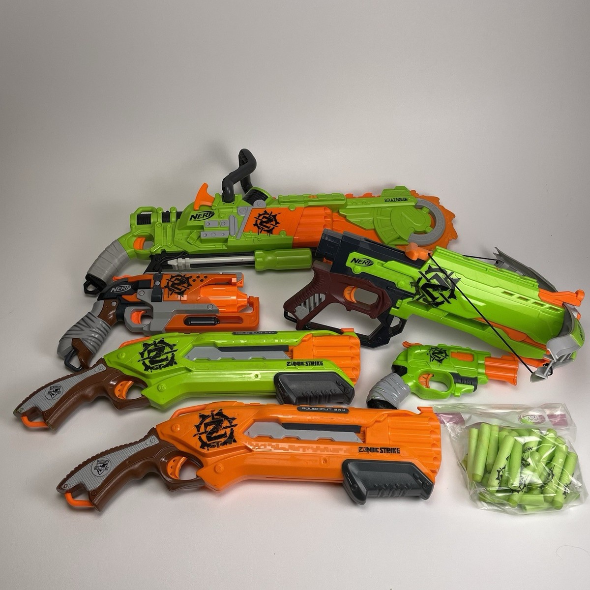 Nerf Zombie Strike Lot Of 7 Brainsaw Roughcut Crossfire Hammershot