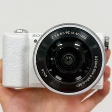 Sony Alpha a5100 24.3MP Mirrorless w/16-50mm Lens Digital Camera White English.