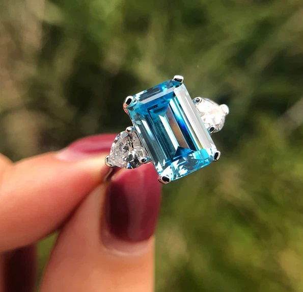 Shiny Clear Sky Blue Radiant Cut 7.22CT Aquamarine With Two CZ Three Stone Ring