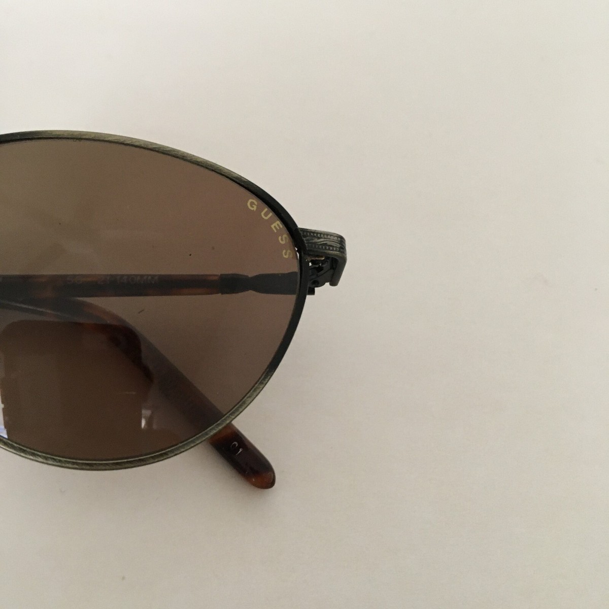 NEW Sunglasses by Guess Tortoise frame 100% UV Guess Sunglasses Pewter Frame Tortoise Resin Arms100% UV  main image 2