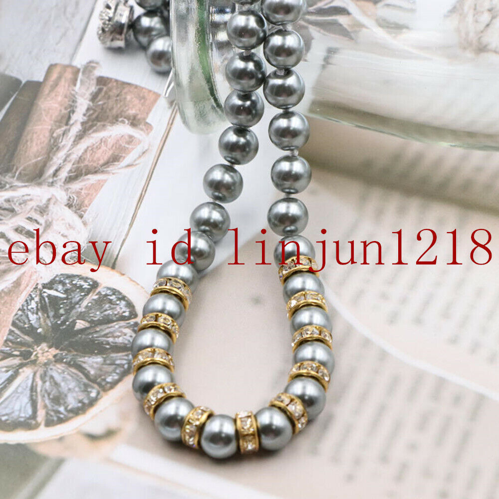 Grey mother of pearl in flat round bead strand 10mm x 40cm Grey mother of pearl in flat round bead strand 10mm x 40cm