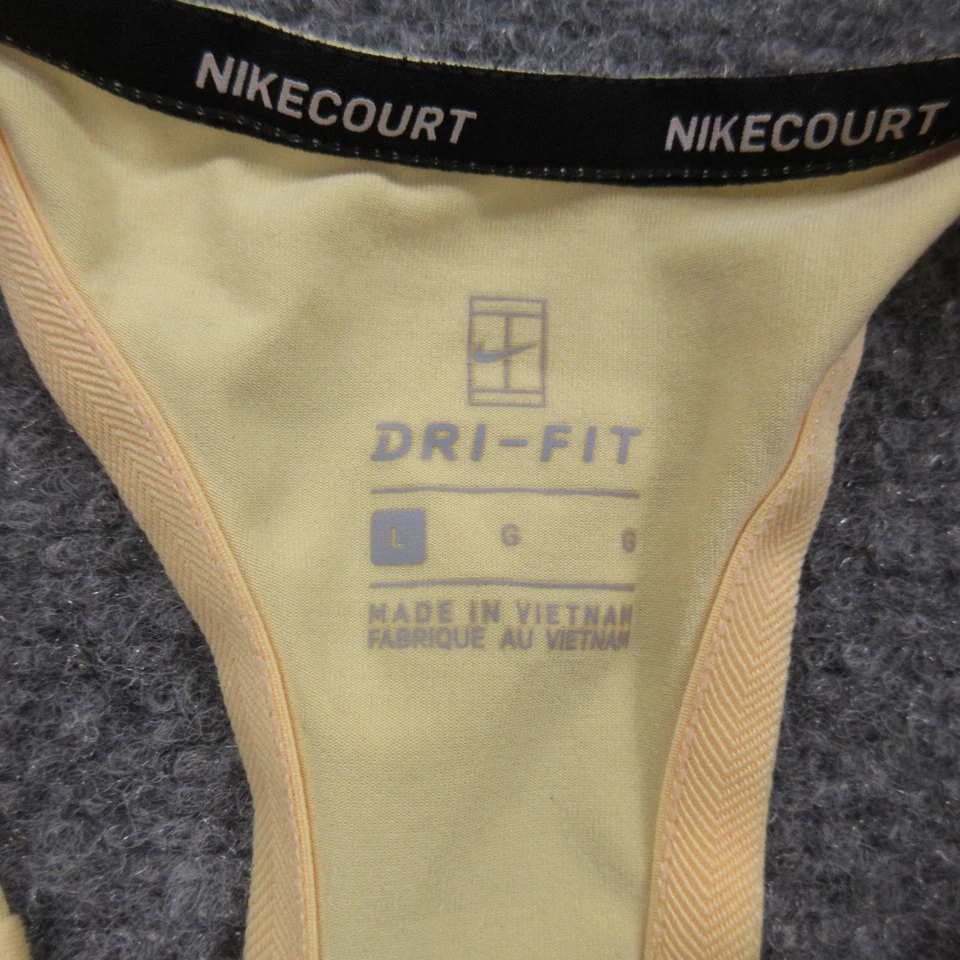 Camiseta sin mangas NikeCourt Dri-FIT grande amarilla espalda deportiva para mujer AO2951-839 Foto 4 de 4