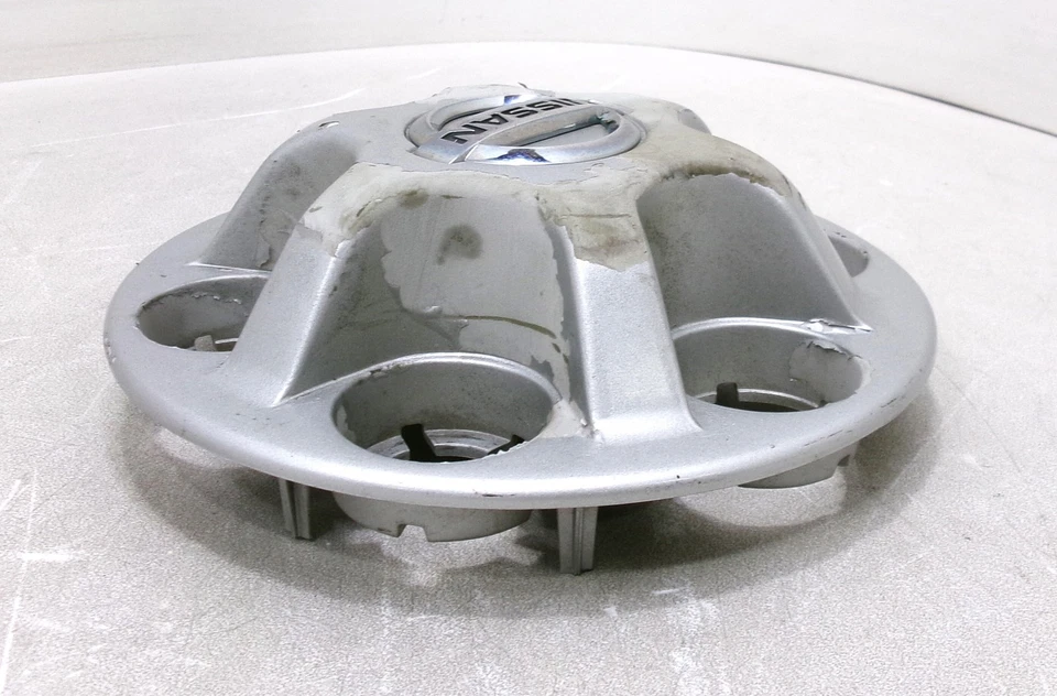 Tapa central plateada para llanta Nissan Xterra 2010 OEM Foto 3 de 4