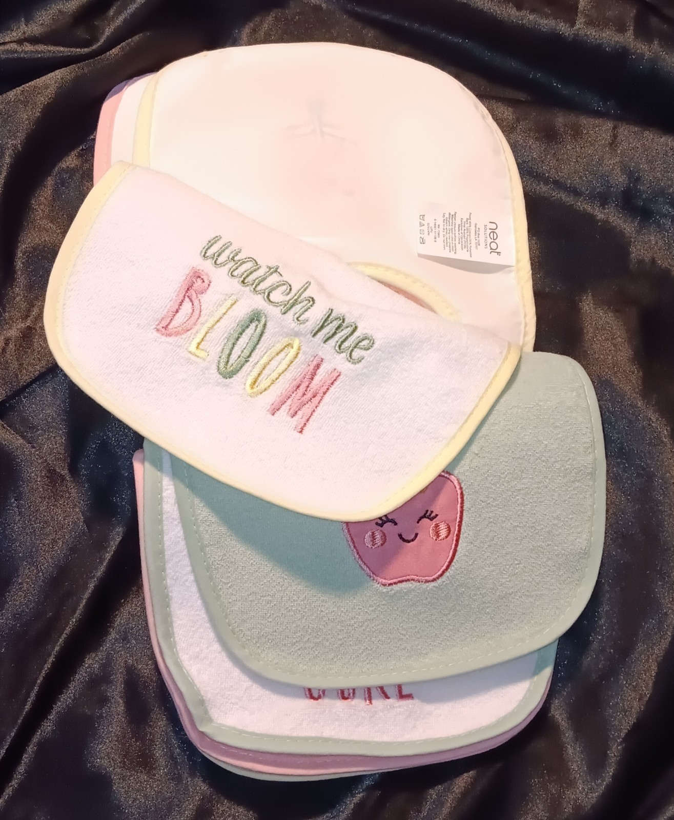 NEAT SOLUTIONS 10 PACK INFANT GIRL STAY DRI/PVC FREE BIB SET. NEW. 0+ MONTHS