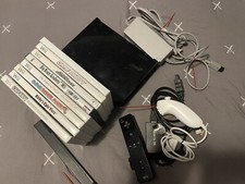 wii bundle with games, Remote, And Original Cords And Sensor Bar
