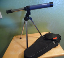 BELL  HOWELL TELESCOPE WITH TABLE TRIPOD AND CARRYING CASE
