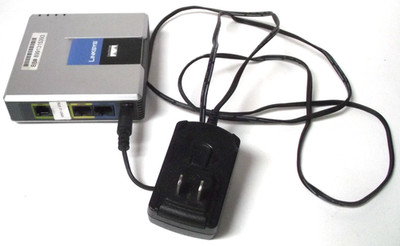 PreOwned Cisco/Linksys Volp Phone Adapter with Router SPA2102-R & Power Supply B