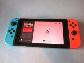 Nintendo Switch System Console w/Neon Red & Blue Joy-Cons + Dock & Extras