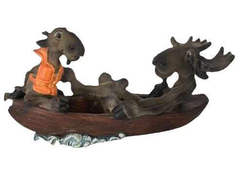 Big Sky Carvers Mountain Mooses Phyllis Driscoll “Row Your Boat”