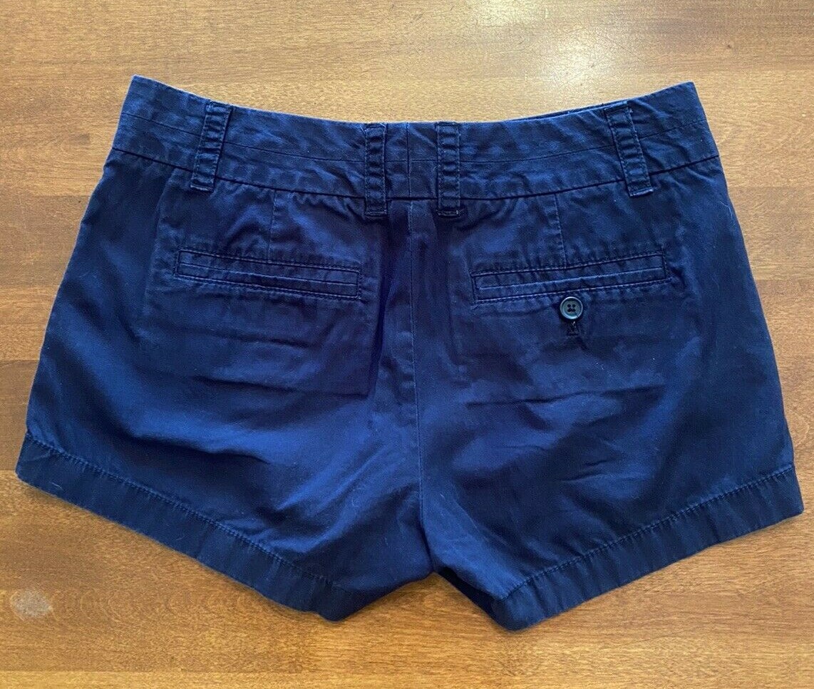 Blue shorts, zipper in front, back & side pockets. S… Gem