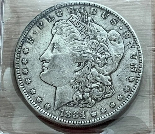 1884-P Morgan Liberty Silver $1 Dollar Coin 90% Silver in plastic folded sleeve