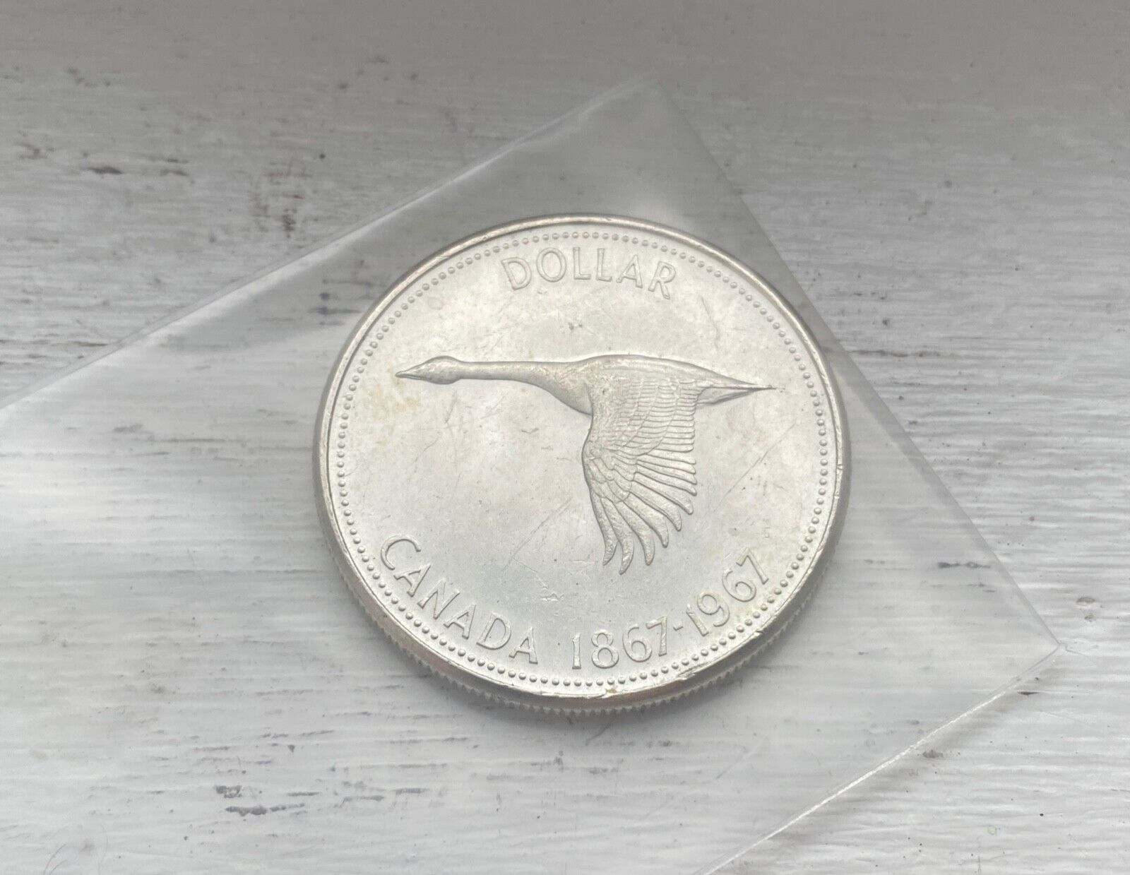 1967 Toned Silver Dollar Canadian 0.60oz 80% Silver 36mm Voyageur 045
