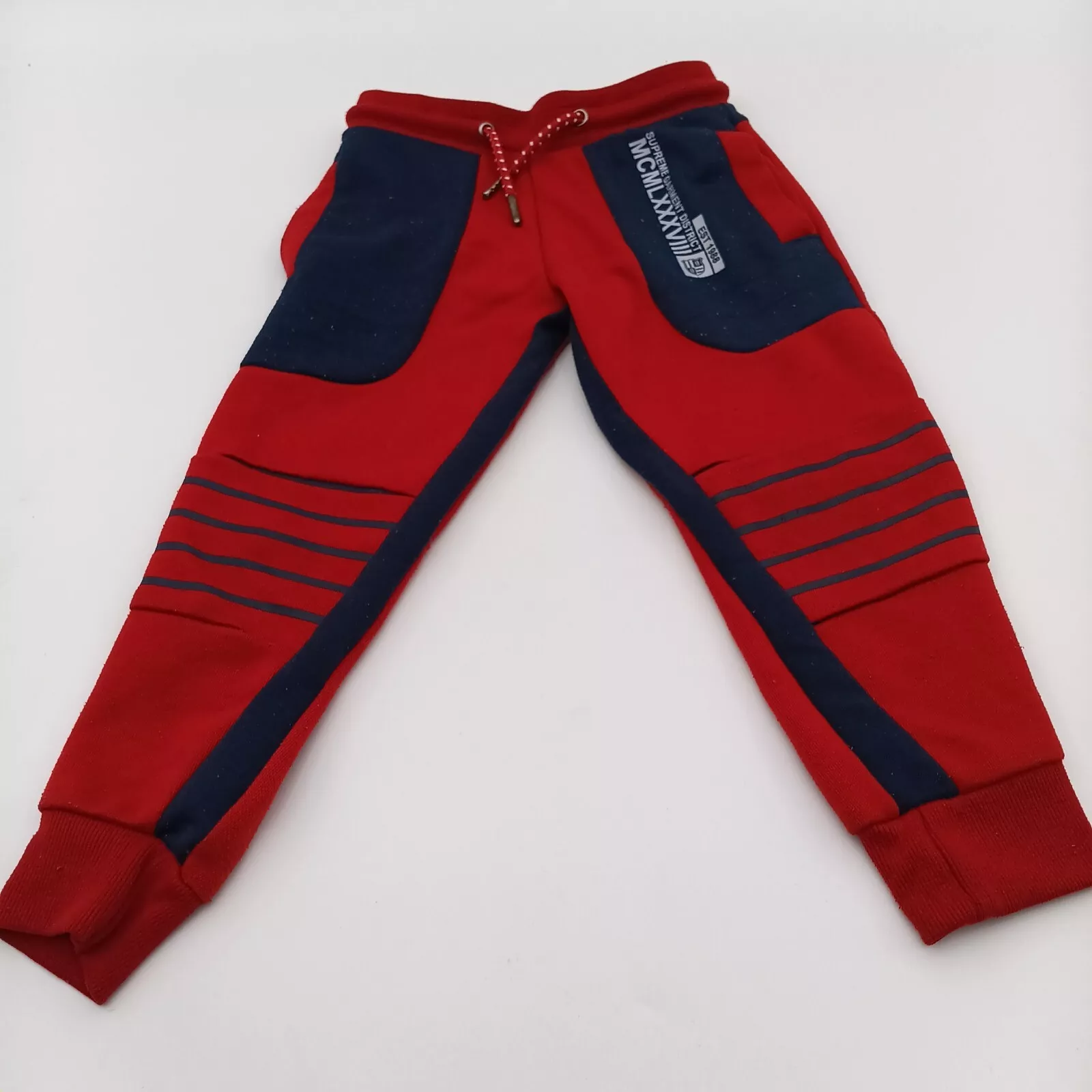 Pantalon de jogging rouge à cordon Supreme Garment District garçon taille 4