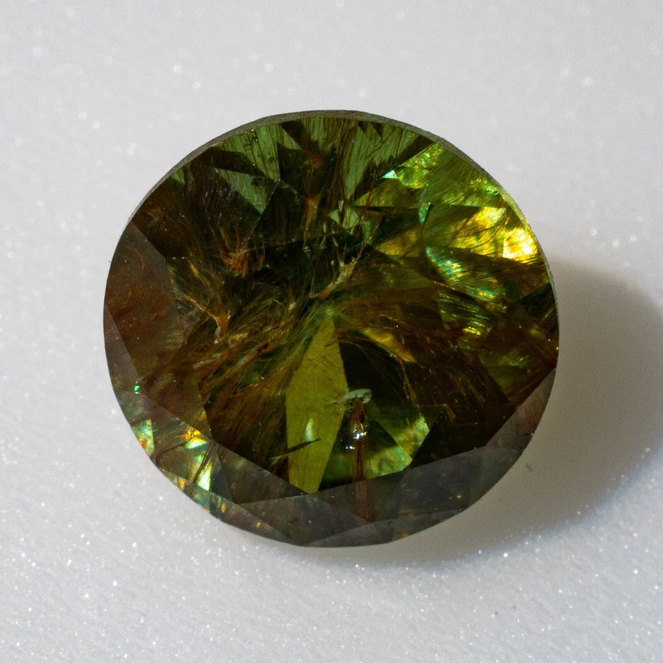 DEMANTOID GARNET  URAL TAGIL 1.45CT, 6.6mm  good dispersion Horsetail inclusion - Image 2 of 4