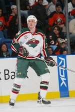 Left wing Derek Boogaard Minnesota Wild looks on v the New Y- Ice Hockey Photo