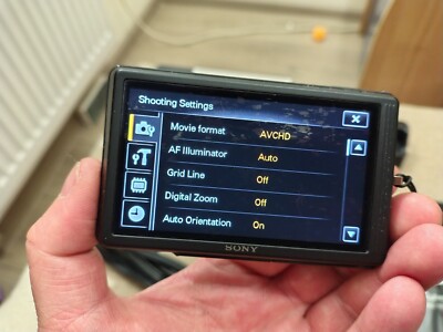 Sony Cyber-shot DSC-TX7 10.2MP Digital Camera - Black Fully