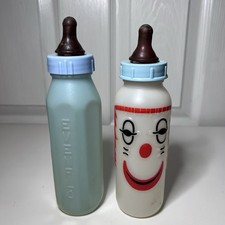 2-Vtg 1970s Baby Bottles 8 oz Curity "Cuddly Clown Nurser" Blue