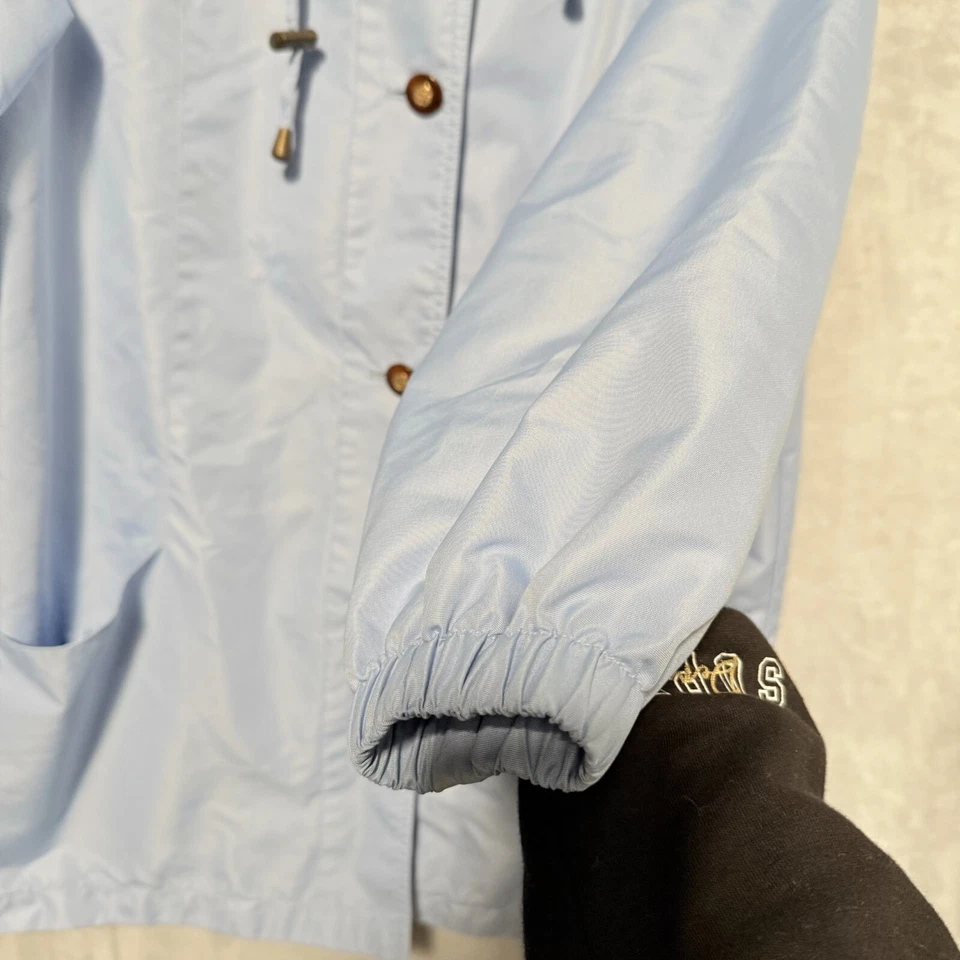 Chaqueta cortavientos Blair para mujer azul medio ligera con capucha cordón botón Foto 3 de 4