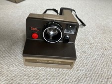 Polaroid SX-70 Land Camera Super Clincher with case, box, tripod, etc.