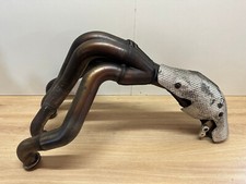 UN COLLECTEUR D ECHAPPEMENT