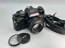 Minolta X-700 35mm SLR Camera w/ 50 mm f1.7 Rokkor Lens, Filter, CLAd