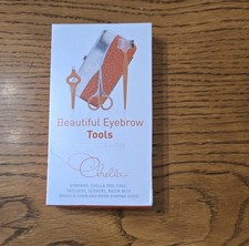NWT Eyebrow Tool Kit ,Brow Glue, Dk Brown Eyebrow Cream, And Pencil/Spoolie