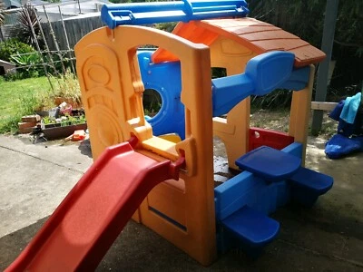 plastic cubby house with slide