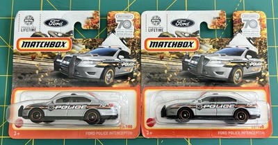 LOT OF 2 - 2023 MATCHBOX FORD POLICE INTERCEPTOR MBX HIGHWAY 23/100 SHORT CARD