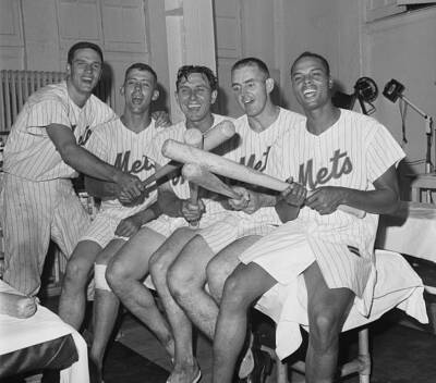 Victorious New York Mets heroes whoop it up dressing room after- 1962 Old Photo