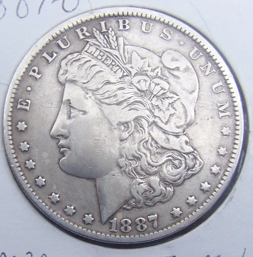 1887-0  MORGAN SILVER DOLLAR   WITH ERROR DIE BREAK AT ONE ON REVERSE VF/XF
