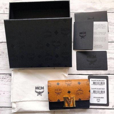 MCM MYS AALM03 BK001 Leather Wallet with 4 Pockets and Zipper Pocket Brown Black