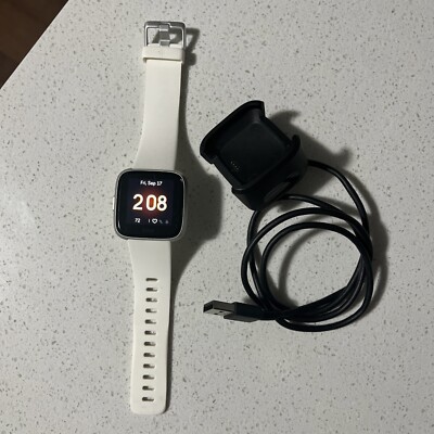 Fitbit FB415 Smartwatch Fitness Activity Tracker White Band Charger