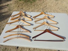 COLLECTABLE VINTAGE WOODEN COAT HANGERS SCHLESINGERS, McGREGOR SPORTSWEAR, ETC..
