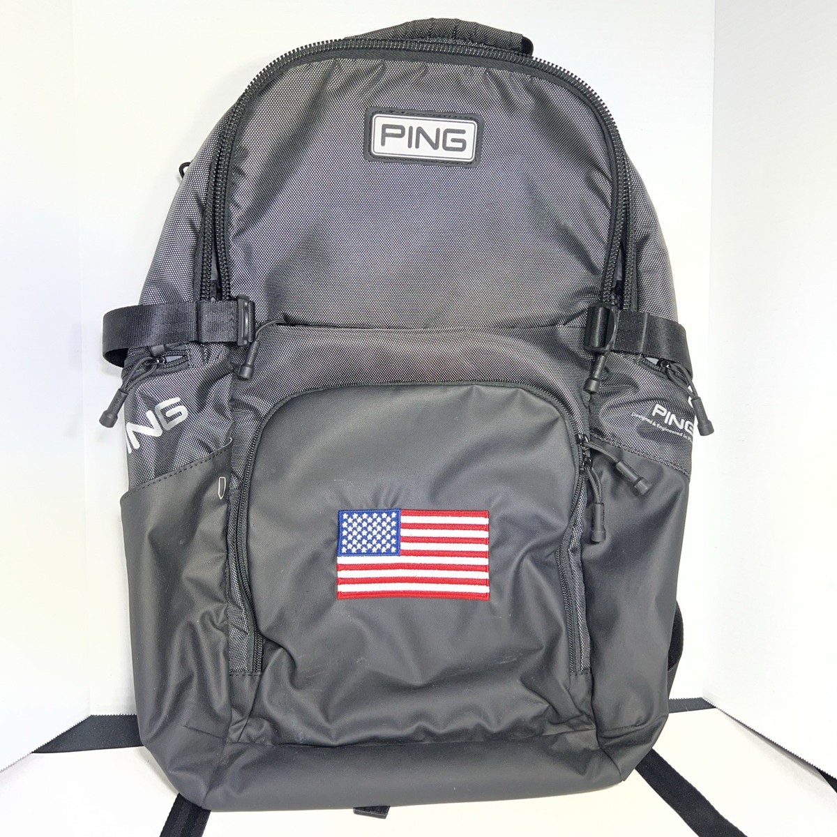 PING USA FLAG AC BKPK214 Gunmetal Black 8 Pocket Backpack Laptop